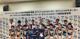 Kento Momota and the Japanese team carry a poster printed with a logo that looked similar to a bird's beak during the press conference on Wednesday. (photo: NBA)