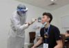 Lee Zii Jia undergoing a Coronavirus swab test. (photo: BAM)