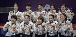 Japan wins the 2018 Asian Games badminton women's team gold medal. (photo: EPA)