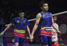 Goh V Shem/Tan Wee Kiong go down in straight-set to Marcus Fernaldi Gideon/Kevin Sanjaya Sukamuljo in Asian Games quarter-finals. (photo: Bernama)