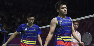 Goh V Shem/Tan Wee Kiong go down in straight-set to Marcus Fernaldi Gideon/Kevin Sanjaya Sukamuljo in Asian Games quarter-finals. (photo: Bernama)