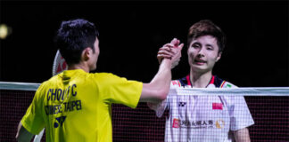 Chou Tien Chen shakes hands with Shi Yuqi after the 2022 Japan Open semi-final match. (photo: Shi Tang/Getty Images)