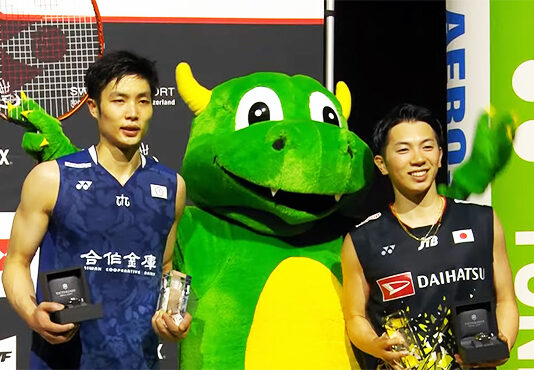 Chou Tien Chen (L) and Koki Watanabe pose for pictures at the 2023 Swiss Open awards ceremony.